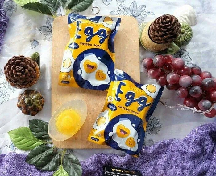 Egg Crystal Soap Packaging display laid on a table