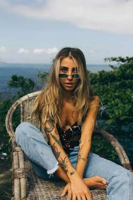 Woman in tiny sunglasses